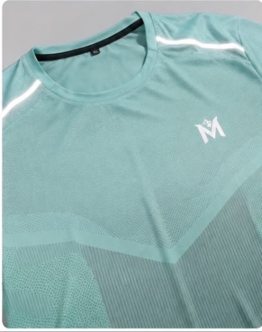 Close-up of mint tee mesh panelling and chest logo