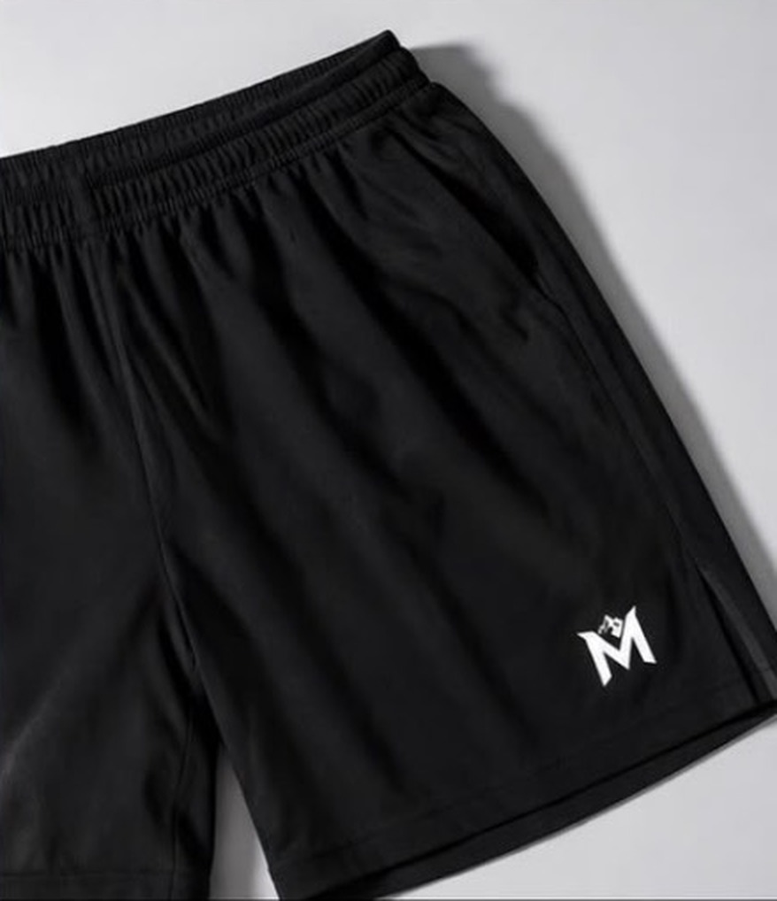 Black training shorts with Moderate Noir mark